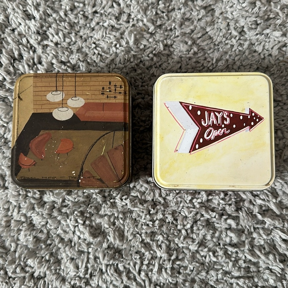 Two Fossil Empty Tins